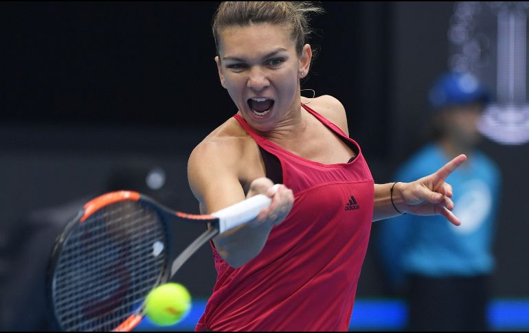 Halep cuenta con 15 títulos en su palmarés y será desde el lunes la jugadora número 25 que lidera la clasificación WTA desde su aparición en 1975, además de la primera rumana. AFP / G. Baker