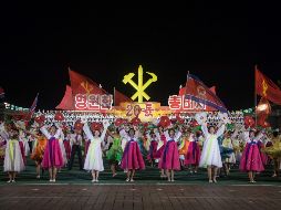 Hoy se conmemoró el 20 aniversario del nombramiento de Kim Jong-il como secretario general del Partido de los Trabajadores con un evento multitudinario. AFP/K. Won-Jin