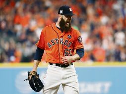 Intratable. Dallas Keuchel lanzó pelota de sólo cuatro imparables en siete entradas de labor, en las que además ponchó a 10 bateadores de los Yankees. AFP