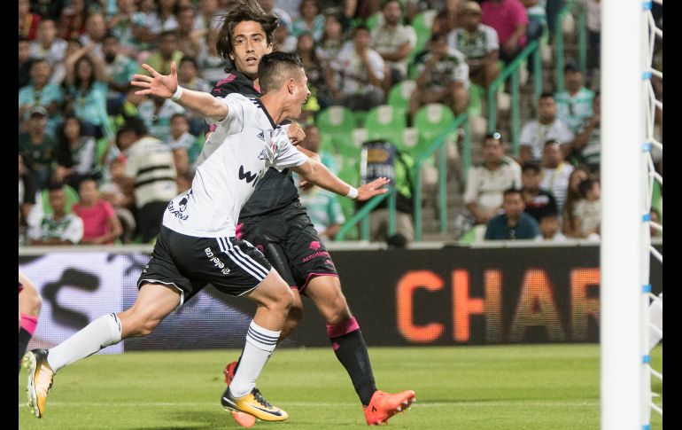 Garnica celebra tras mandar al fondo de las redes la asistencia de Milton Caraglio. MEXSPORT/E. Terrazas.