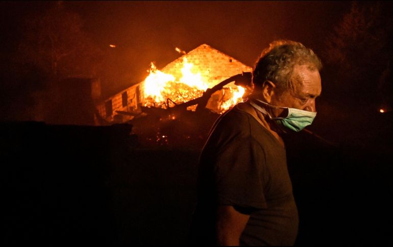 Las llamas han destruido al menos cinco mil 700 edificios. EFE/ N.Ferreira