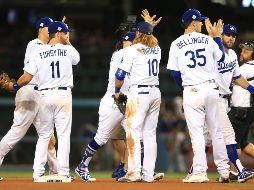 Los Dodgers ganaron con el soberbio pitcheo del zurdo Clayton Kershaw y jonrones de Justin Turner y Chris Taylor. AFP / S. Haffey