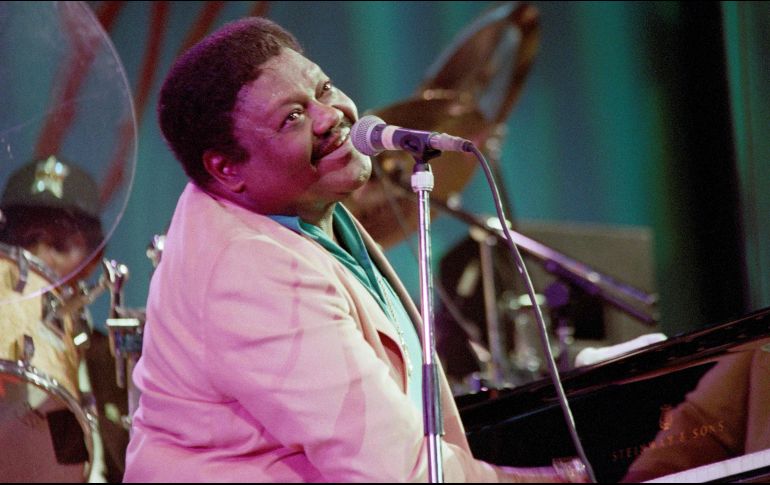 Domino, cuyo beat obsesivo al piano y agradable voz de barítono ayudaron a cambiar la música popular aun mientras honraba la gran tradición de Crescent City, murió a los 89 años. AFP / P. Kovarik