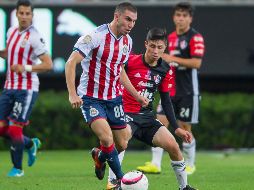 Chivas avanzó a la ronda de cuartos de final eliminando ayer al Atlas. MEXSPORT/C. de Marchena