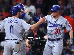 Jugadores de los Dodgers celebran su victoria. AFP/T. Pennington