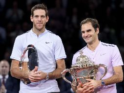 El tenista suizo (derecha) había ganado por última vez el torneo en 2015. AFP/ F. Coffrini