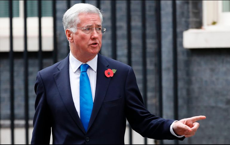 Fallon aclaró a la primera ministra, Theresa May, que seguiría siendo diputado del partido conservador. AFP / ARCHIVO