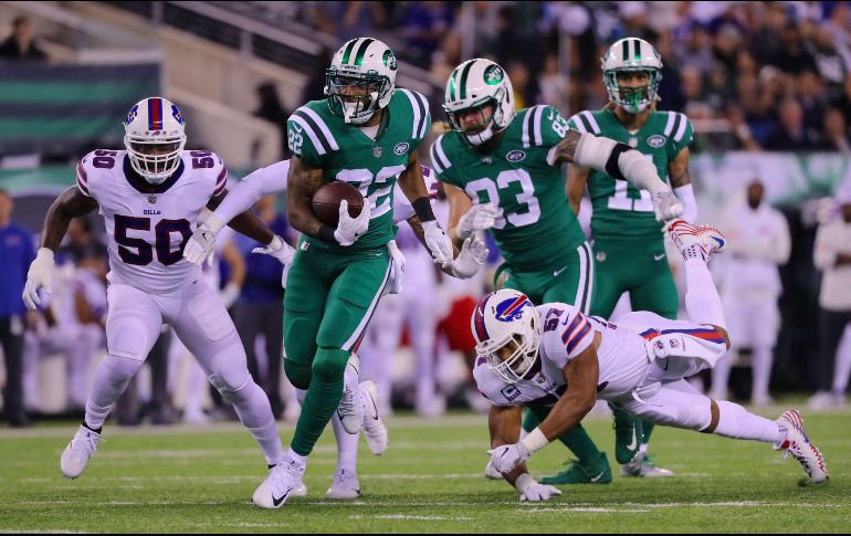Matt Forte (22) anotó en carreras de 10 y 5 yardas y terminó con 14 acarreos para 77 yardas. AFP/A. Parr
