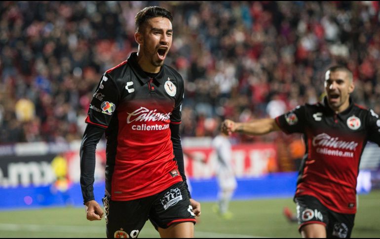 Juan Lucero celebra su anotación contra León, que le dio la victoria a Xolos. NOTIMEX/E. Jaramillo