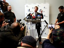 El portavoz Gillles Dejemppe confirma en una rueda de prensa que los políticos catalanes fueron voluntariamente a una comisaría. EFE / O. Hoslel