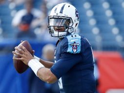 El quarterback de los Titans, Marcus Mariota, lanzó para 218 yardas y dos anotaciones. AFP/A. Lyons