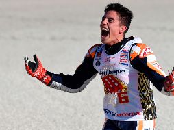 Marc Marquez sólo necesitaba entrar entre los once primeros para revalidar su título mundial, logró mejorar la posición. AFP/J. Jordan