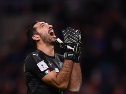 El portero Gianluigi Buffon ve desvanecerse la posibilidad de concluir su brillante carrera con una aparición en una Copa del Mundo. AFP/M. Bertorello