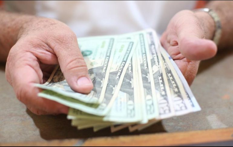 Para este miércoles se prevé que el tipo de cambio cotice entre 19.05 y 19.25 pesos por dólar. EL INFORMADOR / ARCHIVO