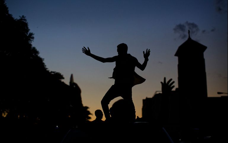 Con baile, no podía ser de otra manera, que los zimbabuenses celebraran este nuevo capítulo en la historia. AP / B. Curtis