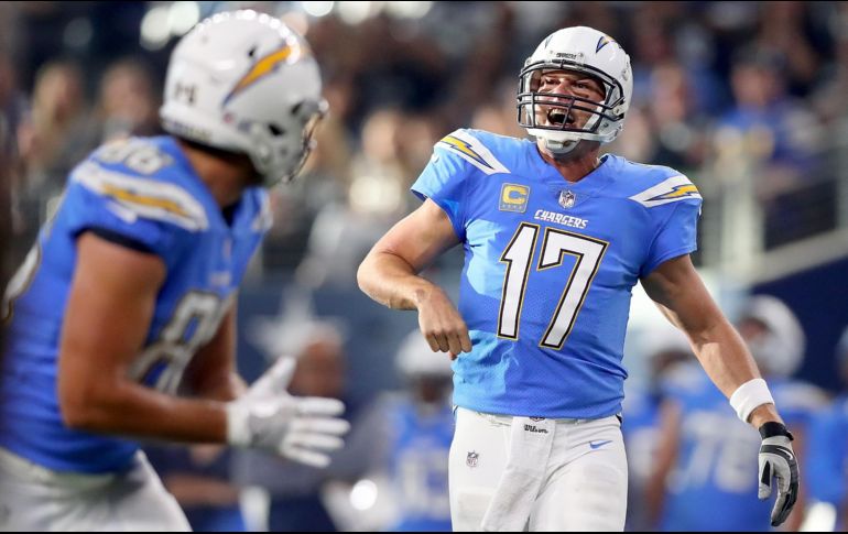 Philip Rivers lanzó para 434 yardas y tres anotaciones durante lo que fue su primer juego de Día de Acción de Gracias en 14 temporadas. AFP / T. Pennington
