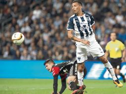 Ampliamente superados. Los rojinegros del Atlas fueron derrotados por el líder Monterrey que sin problemas los despachó del torneo. EFE