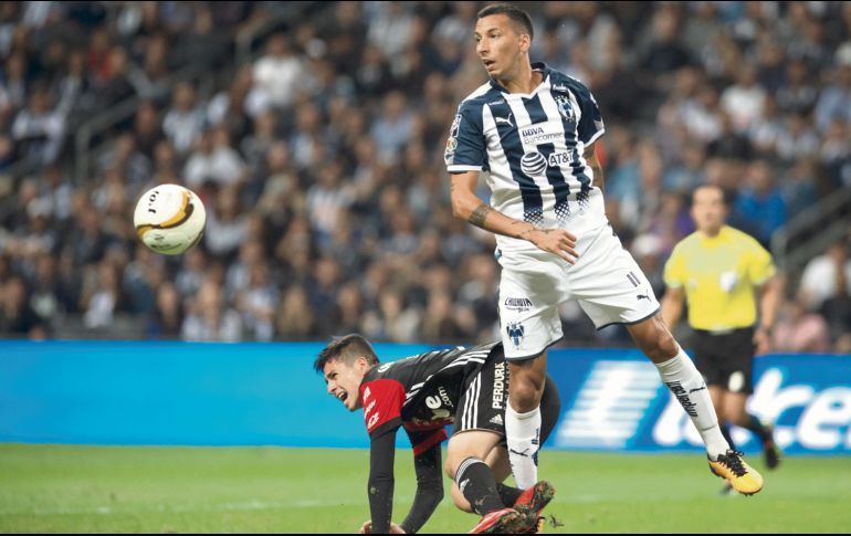 Ampliamente superados. Los rojinegros del Atlas fueron derrotados por el líder Monterrey que sin problemas los despachó del torneo. EFE