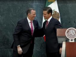 En mensaje a medios el Presidente Peña Nieto (der.) se despidió de un sonriente Meade (izq). YOUTUBE / Gobierno federal