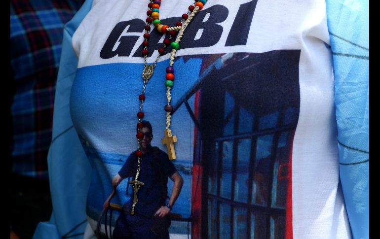 Familiares portaban las fotos de sus seres queridos, de los que no se tienen rastros desde el 15 de noviembre. EFE / A. Mauricio