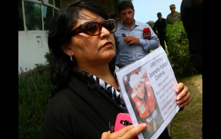 Familiares portaban las fotos de sus seres queridos, de los que no se tienen rastros desde el 15 de noviembre. EFE / A. Mauricio