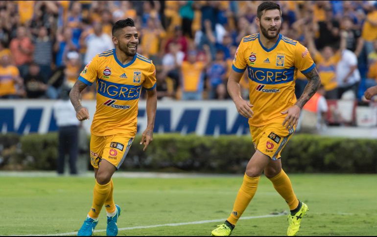 Javier Aquino (I) y André-pierre Gignac (D) arrancan como titulares con los Tigres. MEXSPORT/ARCHIVO