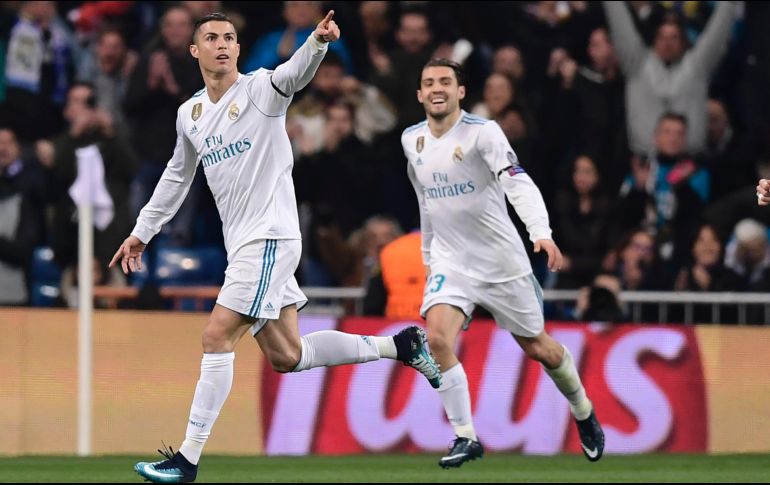 Cristiano (I) celebra su gol, anotado al minuto 12. AFP/J. Sorinao