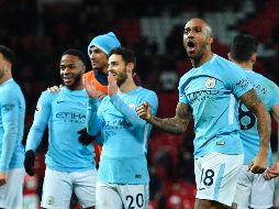 Los jugadores del City celebran al final del partido. AFP/O. Scarff