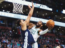 Kyrie Irving. El jugador de los Celtics también aportó siete asistencias ante los Nuggets. AFP