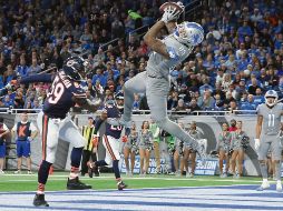 Eric Ebron (#85) atrapa en las diagonales un pase de Matt Stafford para cerrar la victoria de los Lions. AFP/I. Halip