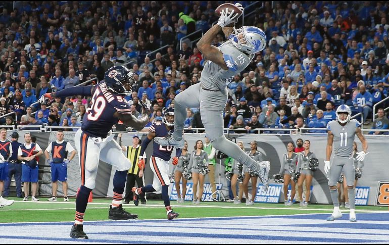 Eric Ebron (#85) atrapa en las diagonales un pase de Matt Stafford para cerrar la victoria de los Lions. AFP/I. Halip