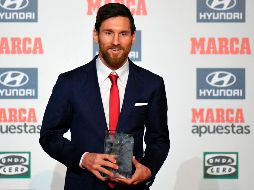 El astro del Barcelona reitera que su compromiso es la obtención de más títulos con el grupo que distinciones individuales. AFP / L. Gene
