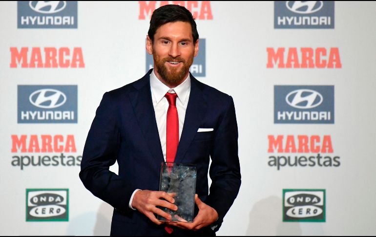El astro del Barcelona reitera que su compromiso es la obtención de más títulos con el grupo que distinciones individuales. AFP / L. Gene