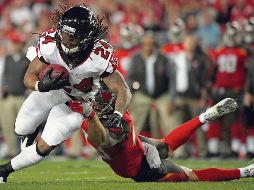 Halcones mejoró su récord a 9-5 para afianzarse en puestos de comodín para la siguiente ronda. AP/P. M. Ebenhack