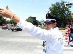 La totalidad del personal de la Policía Vial trabaja de manera ordinaria, aunque refuerza la vigilancia en plazas comerciales, mercados, centros de recreación. EL INFORMADOR / ARCHIVO