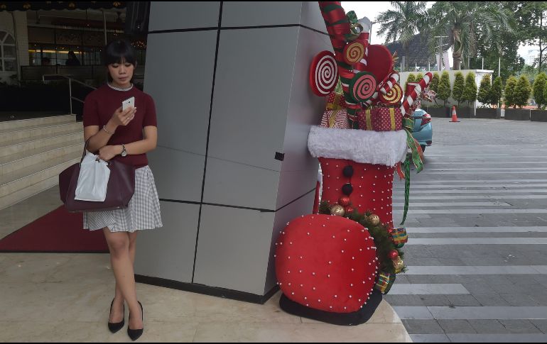 Es innegable que para esa reunión tan especial de Navidad desees lucir lo mejor posible. AFP/A. Berry