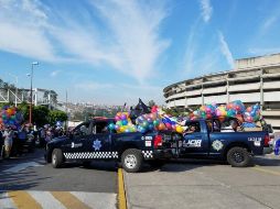 La caravana partió del Edificio Central de la Comisaría hacia colonias como Santa Ceciliia, Huentitán, El Bethel, entre otras. TWIITTER / @PoliciaGDL