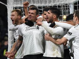 Con un gol del defensa estonio Ragnar Klavan en el descuento, el Liverpool salva la victoria ante el Burnley. AFP / R. Scarff