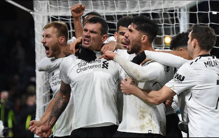 Con un gol del defensa estonio Ragnar Klavan en el descuento, el Liverpool salva la victoria ante el Burnley. AFP / R. Scarff