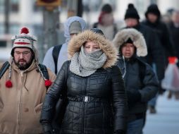 Meteorólogos pronostican que la masa de aire ártico continuará fuerte sobre los dos tercios orientales del país hasta el final de la semana. AFP / S. Olson
