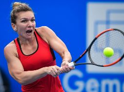 Tras este éxito en el cuadro individual, Simona Halep tratará de rubricar su doblete en Shenzhen junto con su compatriota Irina-Camelia Begu. AFP
