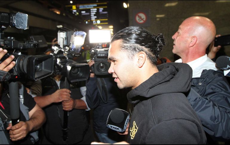 A su arribo al aeropuerto internacional de la Ciudad de México, Peña evitó dar declaraciones. NTX/G. Durán