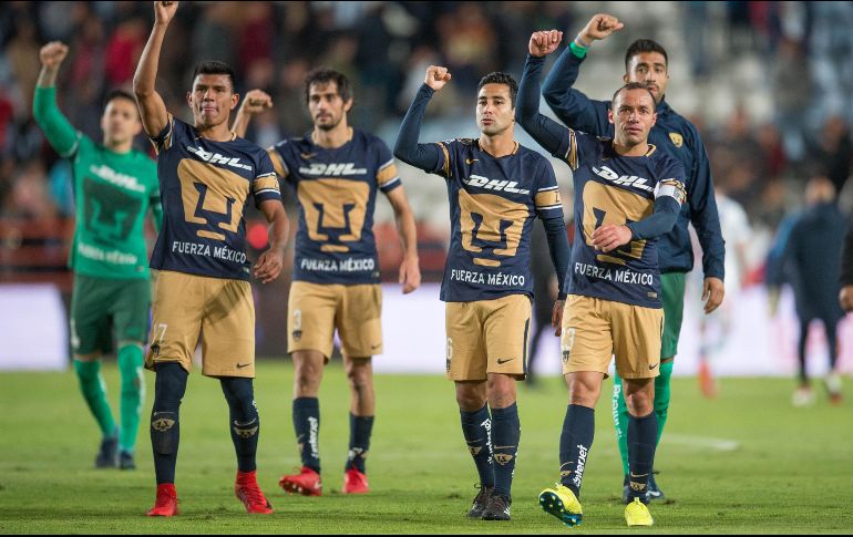 Jugadores de Pumas celebran su triunfo ante Pachuca. MEXSPORT/J. Ramírez