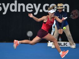 Kerber se impuso a la checa Lucie Safarova por 6-7 (3), 7-6 (8) y 6-2, en dos horas y 28 minutos. AFP/P. Parks