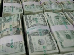 El grupo financiero Ve por Más (BX+) prevé que el tipo de cambio se cotice entre 19.24 y 19.32 pesos por dólar. EL INFORMADOR / ARCHIVO