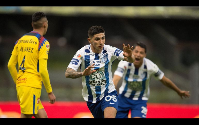 Con permiso. Guzmán celebra el tanto que significa el 2-2 para los Tuzos en el Estadio Azteca. MEXSPORT/J. Ramírez