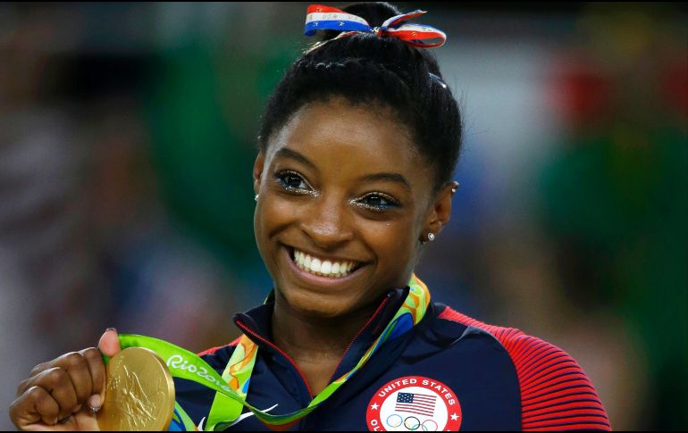 Biles dijo que había luchado con su decisión de hacer pública su historia desde que estalló el escándalo. AP / ARCHIVO