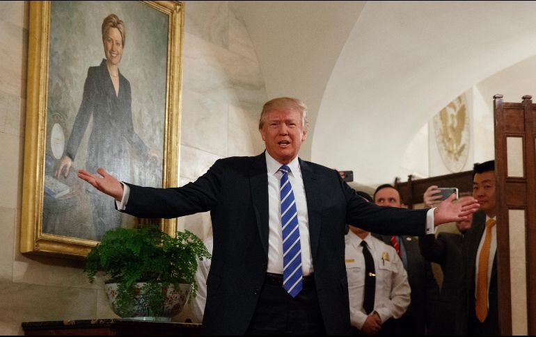 El mandatario asegura que pagar el muro es una insignificancia en comparación con lo que México gana de EU con el TLCAN. AP / ARCHIVO