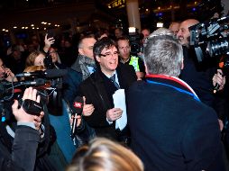 En medio de un gran número de periodistas que se dieron cita en el aeropuerto, Carles Puigdemont arribó a Dinamarca esta mañana. AFP/T. Mikkel