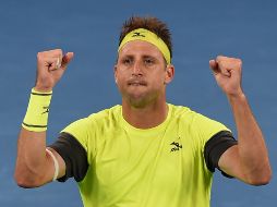 Tennys Sandgren celebra una vez culminado el partido. AFP/G. Wood